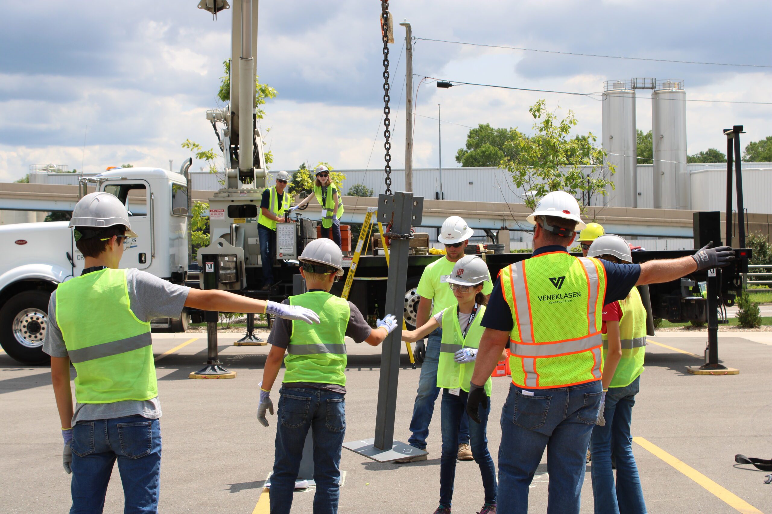 WMCI Middle School Construction Camp students get hands on experience with a crane and how steel buildings are erected.